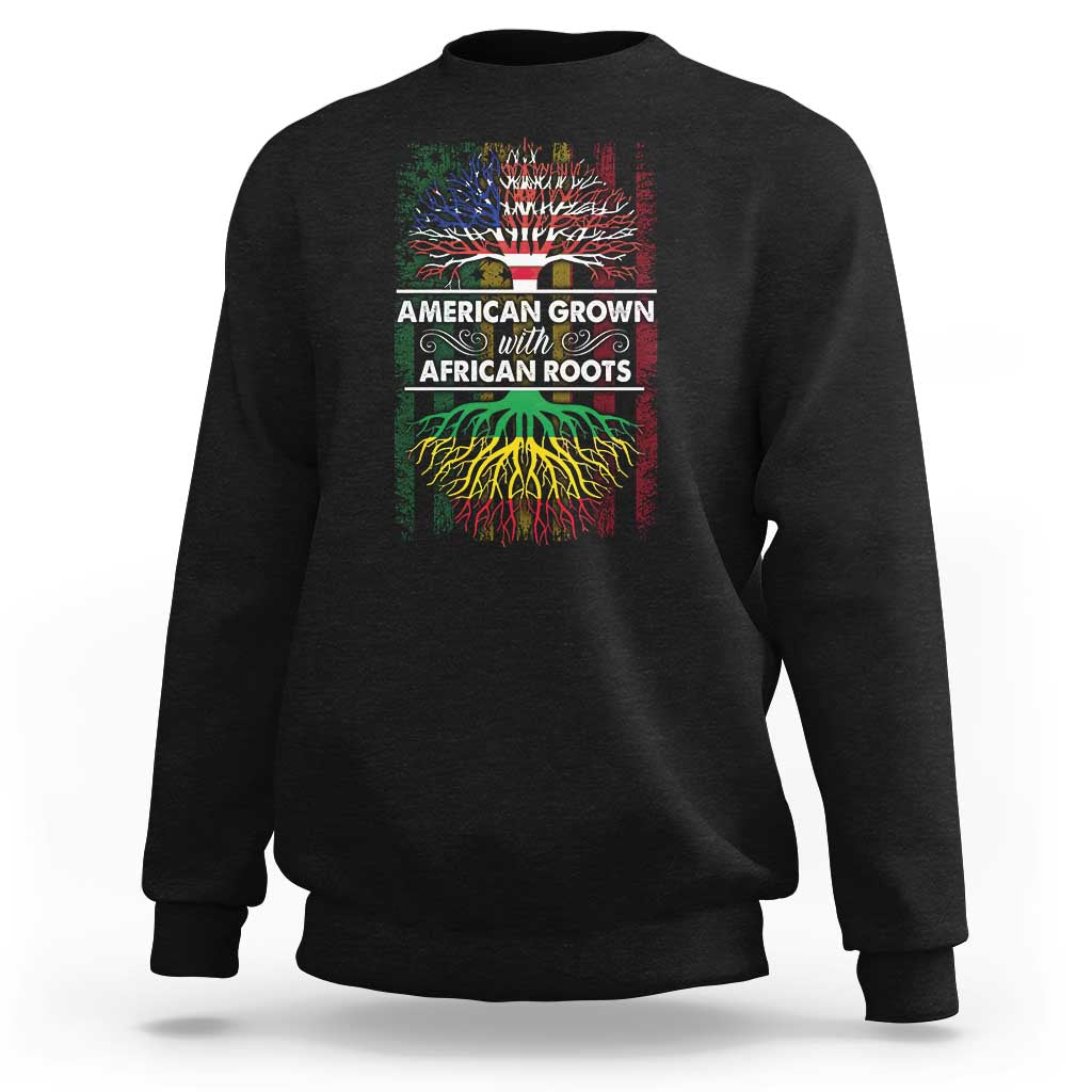 Black sweatshirt with front graphic text “American Grown with African Roots”