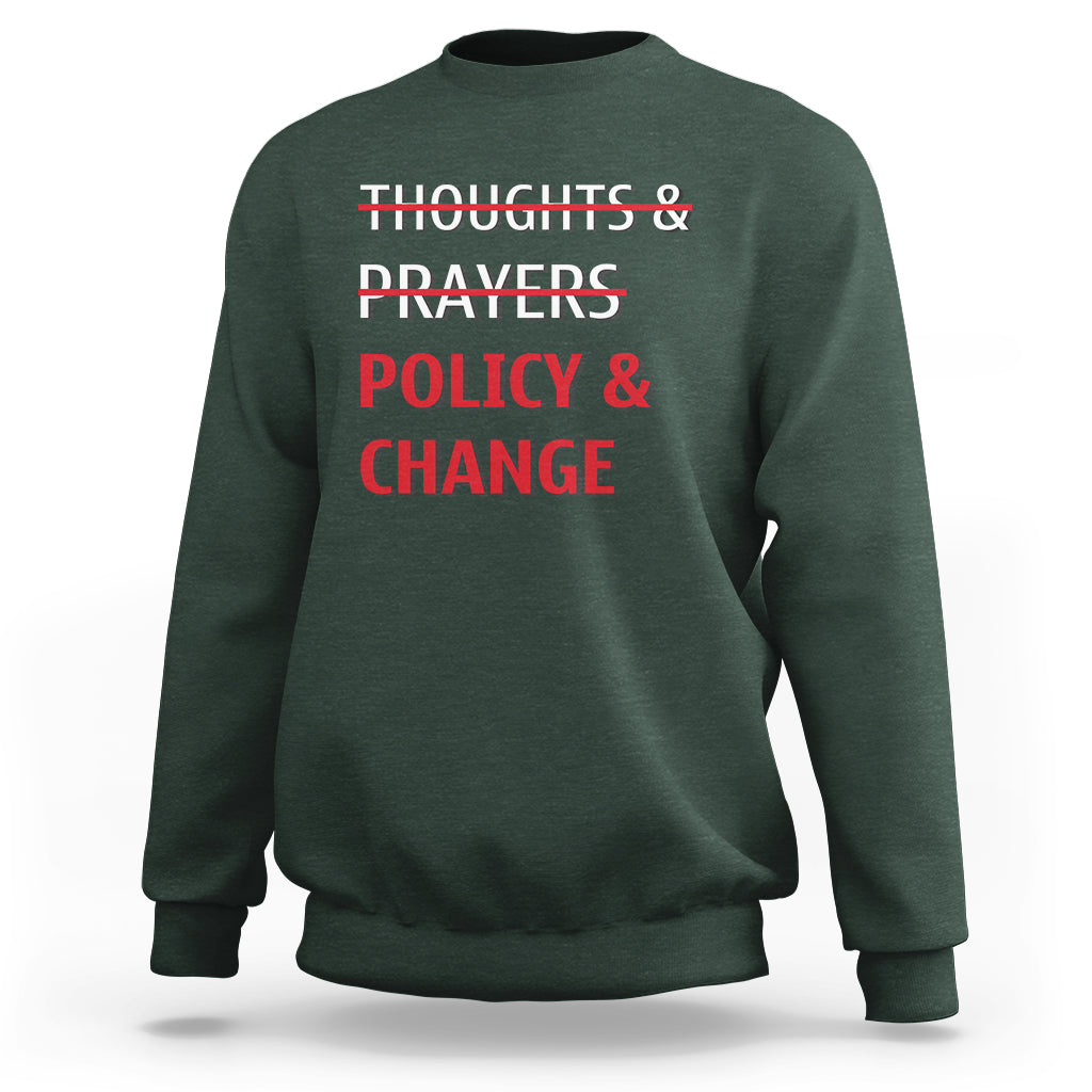 Forest green crewneck sweatshirt with red 'Thoughts & Prayers Policy & Change' print
