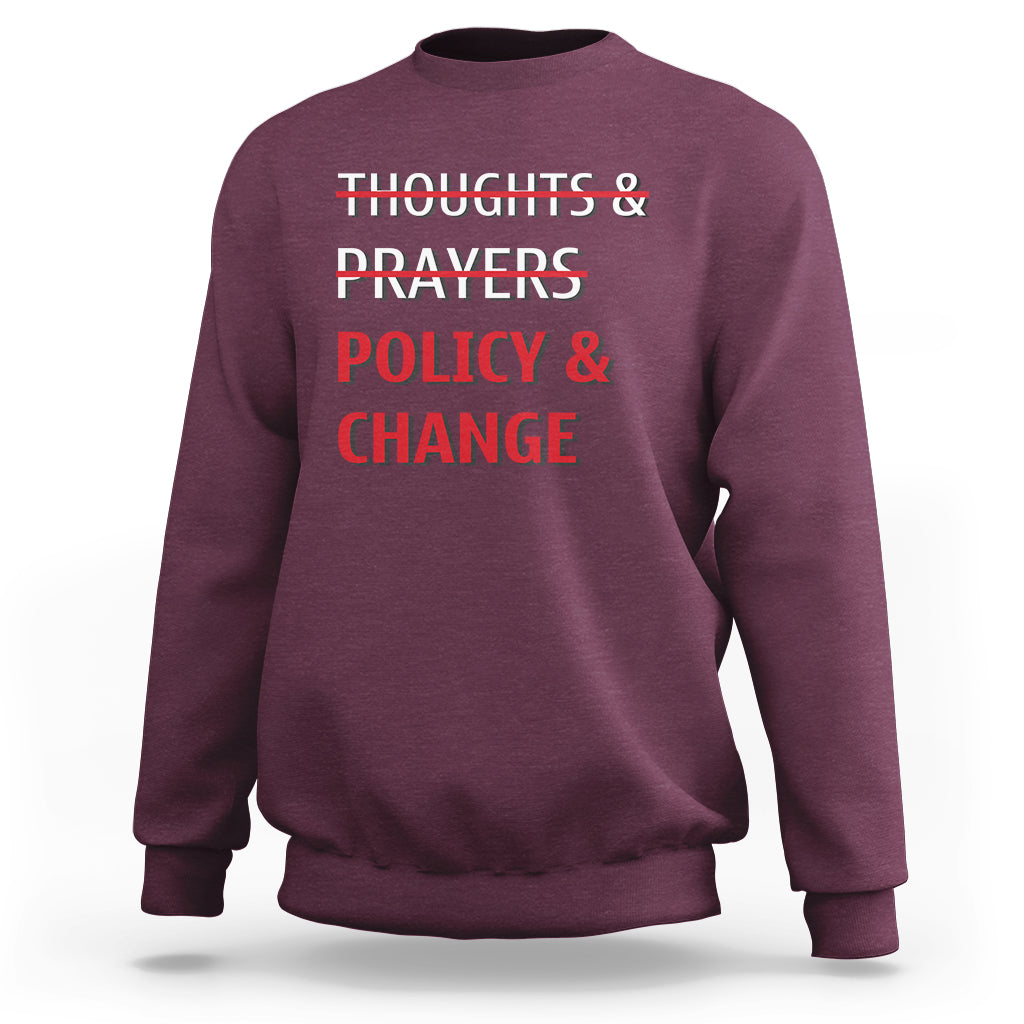 Maroon crewneck sweatshirt with red 'Thoughts & Prayers Policy & Change' print