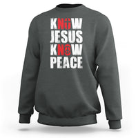 Dark heather sweatshirt with 'KNOW JESUS KNOW PEACE' graphic in white/red text.