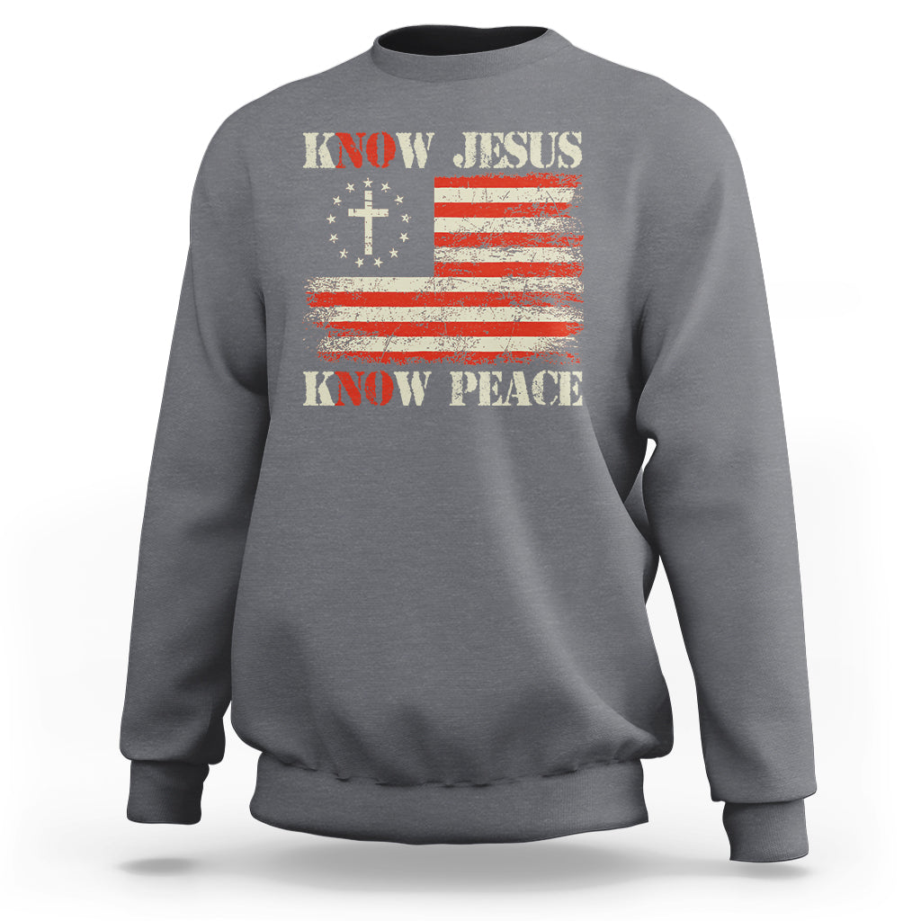 Charcoal crewneck sweatshirt with Know Jesus cross and Know Peace American flag graphic