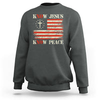 Dark heather gray crewneck sweatshirt with Know Jesus cross and Know Peace American flag graphic