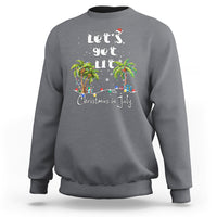 Gray crewneck sweatshirt with Christmas-in-July palm tree graphic and string lights