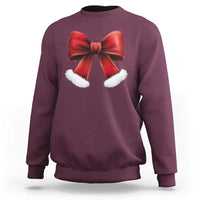 Maroon sweatshirt with large red bow and white furry trim at center chest