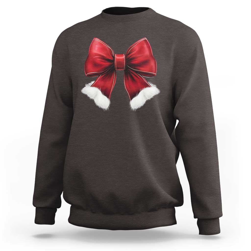 Dark chocolate crewneck sweatshirt with red bow and white pom accents on chest