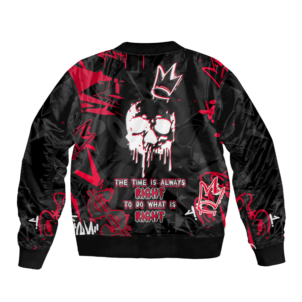 Black bomber jacket with red skull graphic and slogan text across the front