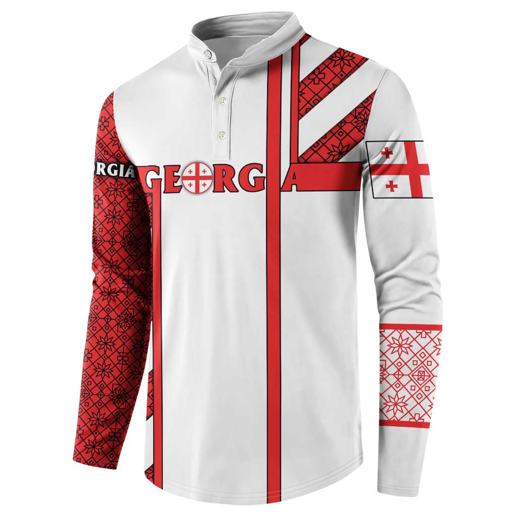 White button sweatshirt with red Georgia stripes, crest on front, patterned sleeves.