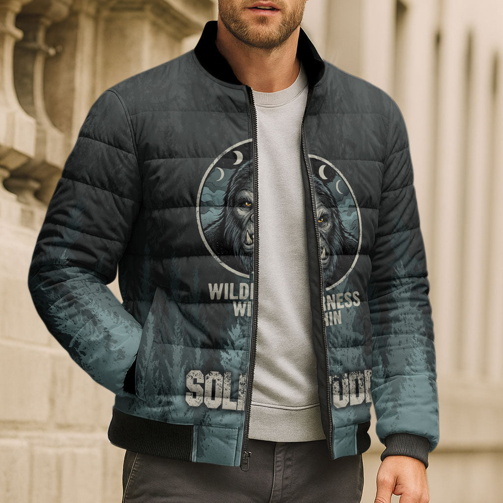 Bigfoot Wilderness Solitude Bomber Puffer Jacket Cryptid Forest Graphic In Distressed Vintage Style