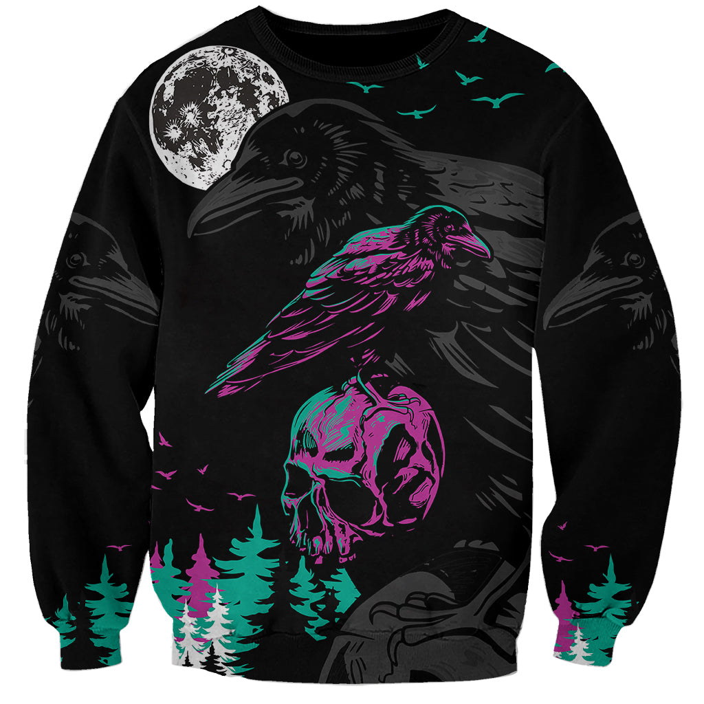 Black unisex sweatshirt with raven and skull artwork, crescent moon, teal forest trees