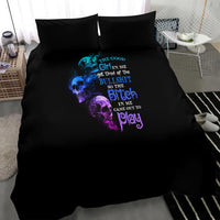 Black duvet and two pillowcases showing blue/purple skull quote graphic