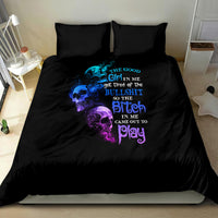 Black bedding set with blue/purple skull quote graphic on duvet and two pillows