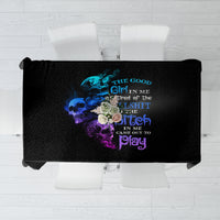 Black tablecloth with neon blue, purple, and pink printed design