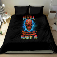Black duvet and two pillowcases with flaming skull graphic and 'TO HELL' lettering