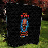 Black quilt blanket with colorful skull graphic and text, curved corner hem detail