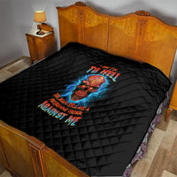 Black quilt blanket with diamond quilting and colorful skull graphic, on top of bed