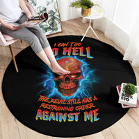 Black round carpet with skull graphic, blue lightning, and bold 'AGAINST ME' text