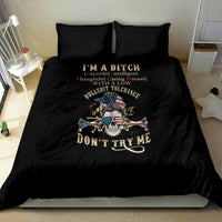 Black duvet cover bedding set with two pillows and colorful skull-and-swords emblem