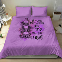 Purple bedding set with skull character artwork and bold text print, styled with two pillows