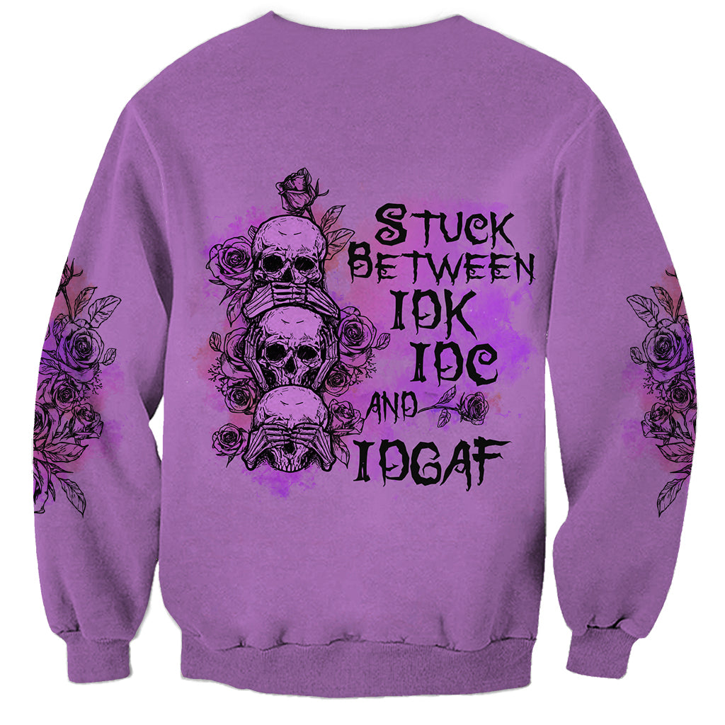 Purple unisex sweatshirt with back skull-and-rose graphic and stacked lettering