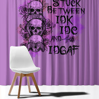 Purple window curtain panel with black skull graphic and dark text accents