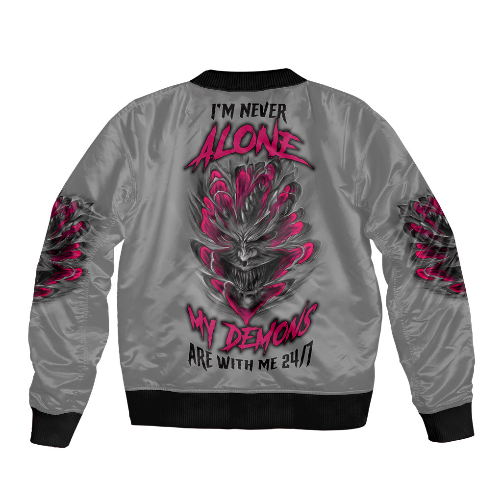 Gray satin bomber jacket with ribbed collar and bold back skull demon graphic in pink