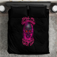 Black bedding set, top view: comforter and two pillows with pink skull text design