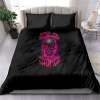 Black bedding set with two pillows and skull graphic in pink and purple, comforter