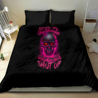 Black bedding set with two pillows and central skull graphic in pink, matching comforter