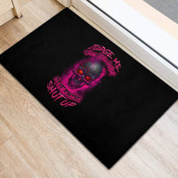 Black rubber doormat with pink skull graphic and judge-me text