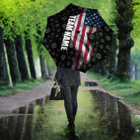 Black patterned umbrella with American flag panel and vertical TEAM text