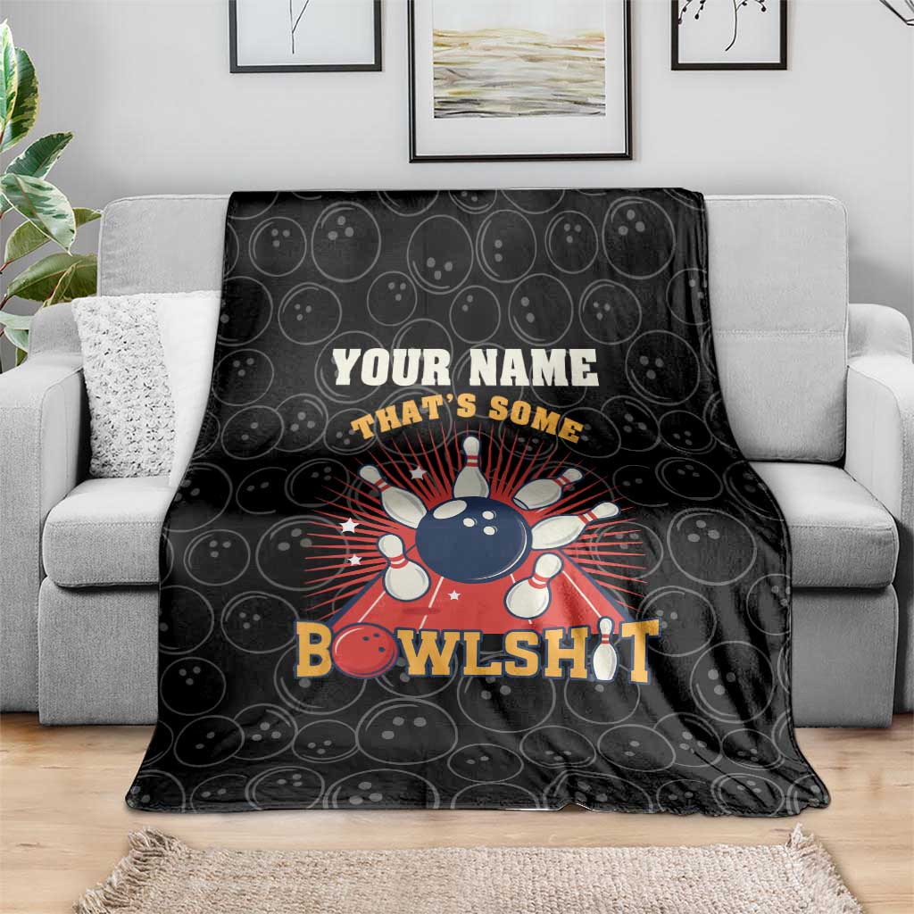 Black bowling blanket draped over sofa with 'Your Name' and bowling pin graphic