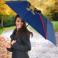 Blue umbrella with large cartoon bird and island map graphic, red stripe trim