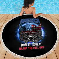 Round black beach blanket with white fringe featuring America skull with wings and slogan text.