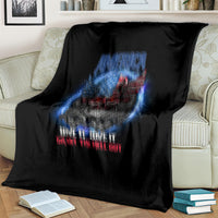 Black throw blanket showing close-up eagle skull graphic in blue and red.