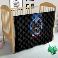 Black quilt with diamond quilting and patriotic skull graphic in wooden crib