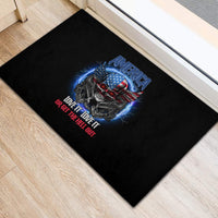 Black rubber doormat with America skull graphic and red slogan text