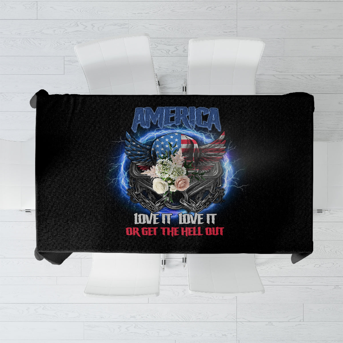 Folded black tablecloth showing America crest graphic with blue light effects