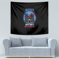 Black tapestry wall hanging with America eagle skull graphic and multicolor slogan print.