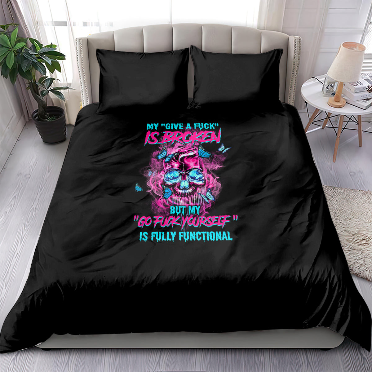 Black bedding set with two pillowcases and colorful skull graphic on duvet