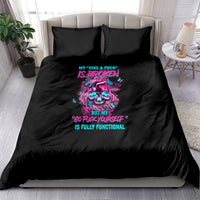 Black bedding set with two pillowcases and colorful skull graphic on duvet