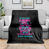 Black throw blanket with colorful skull graphic and neon text slogan