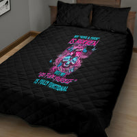 Black quilt bed set with quilted diamond pattern and colorful skull graphic center