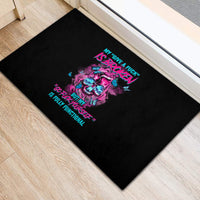 Black rubber doormat with multicolor skull graphic and slogan text