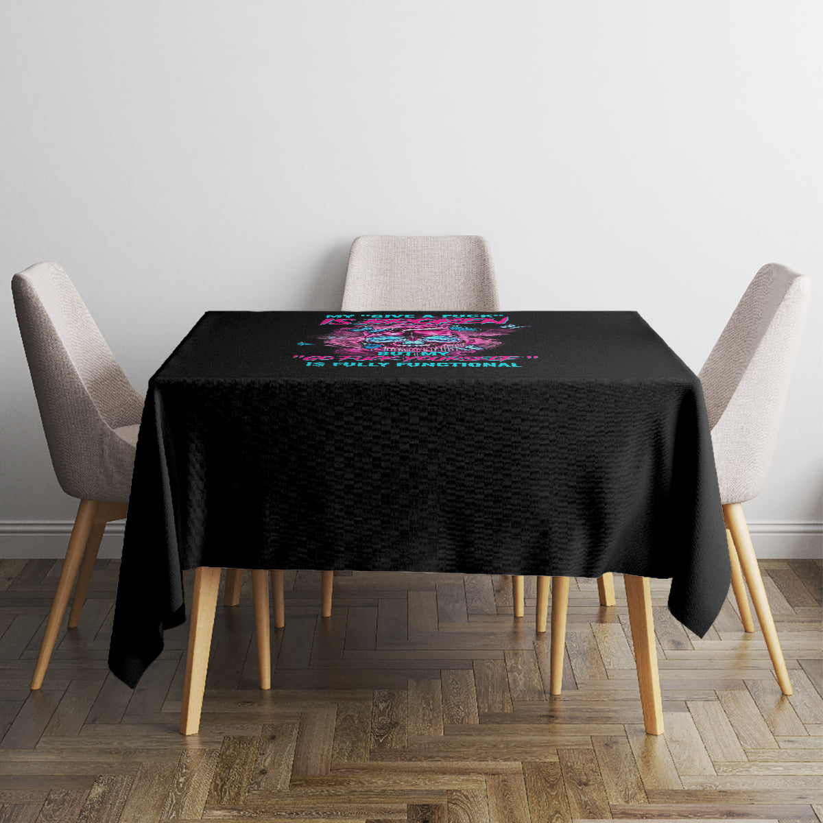 Black square tablecloth with colorful graphic print on dining table