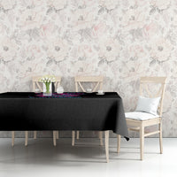 Black tablecloth with colorful graphic print on dining bench table