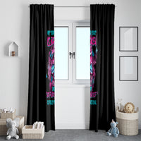 Black window curtains with colorful skull print hanging on each side of white door