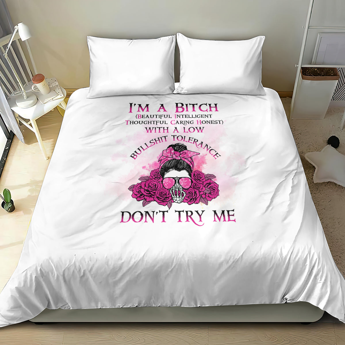 White duvet cover with pink skull-and-flowers graphic and 'DON'T TRY ME' text, plus pillowcases