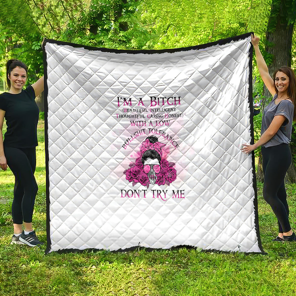 White quilt with diamond stitching and pink graphic text "DON'T TRY ME".