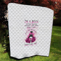 White quilt with diamond pattern and pink character, rose, and quote "DON'T TRY ME".