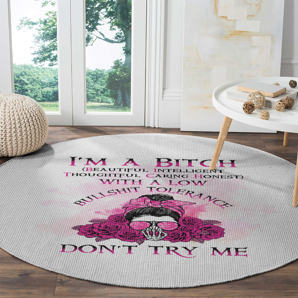Grey round carpet with pink rose skull and DON'T TRY ME slogan near center